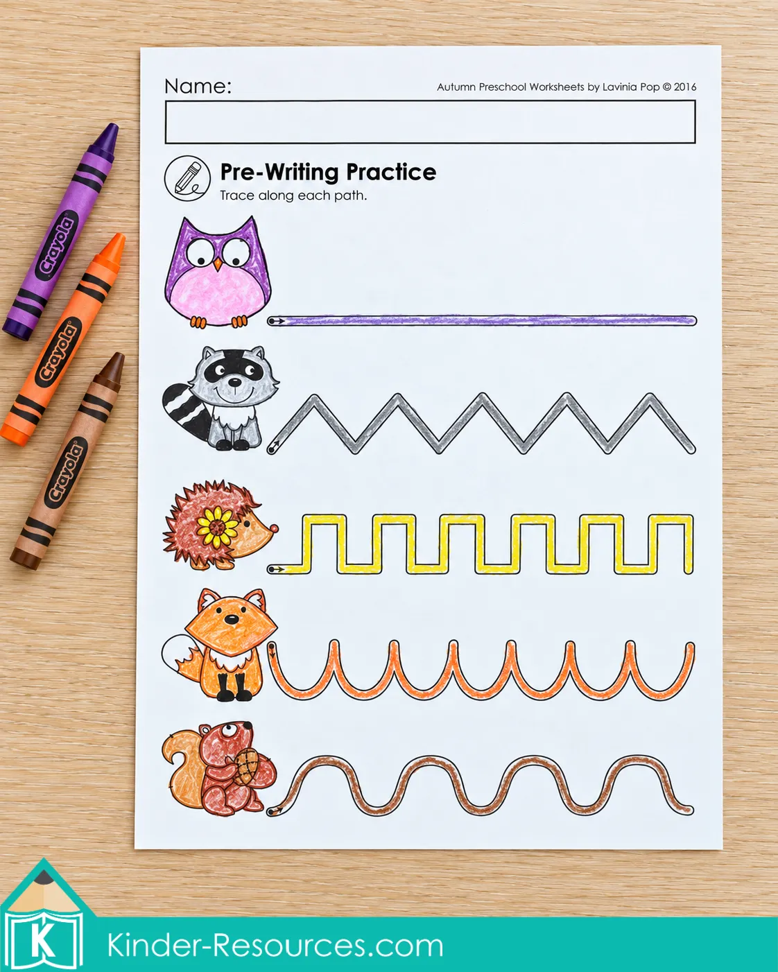 Preschool fall pre-writing worksheet with woodland animals beside straight, zigzag, stepped, curved, and wavy lines for tracing.