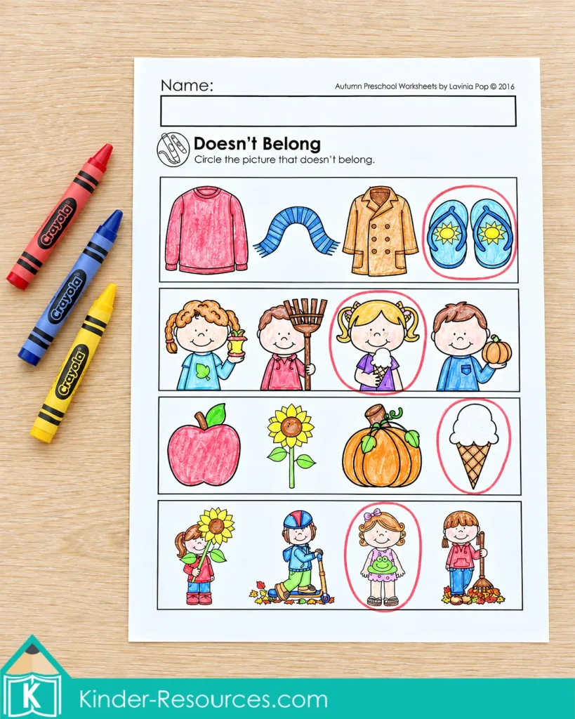 Preschool fall categorization worksheet with four rows of seasonal pictures and the item that doesn’t belong circled in each row.